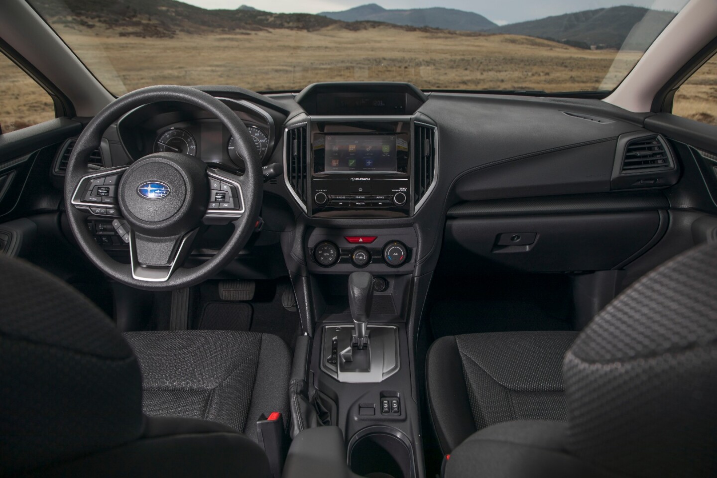 The interior of the 2017 Impreza is well-designed, but continues with the Subaru brand’s penchant for less impressive materials and monochrome color schemes