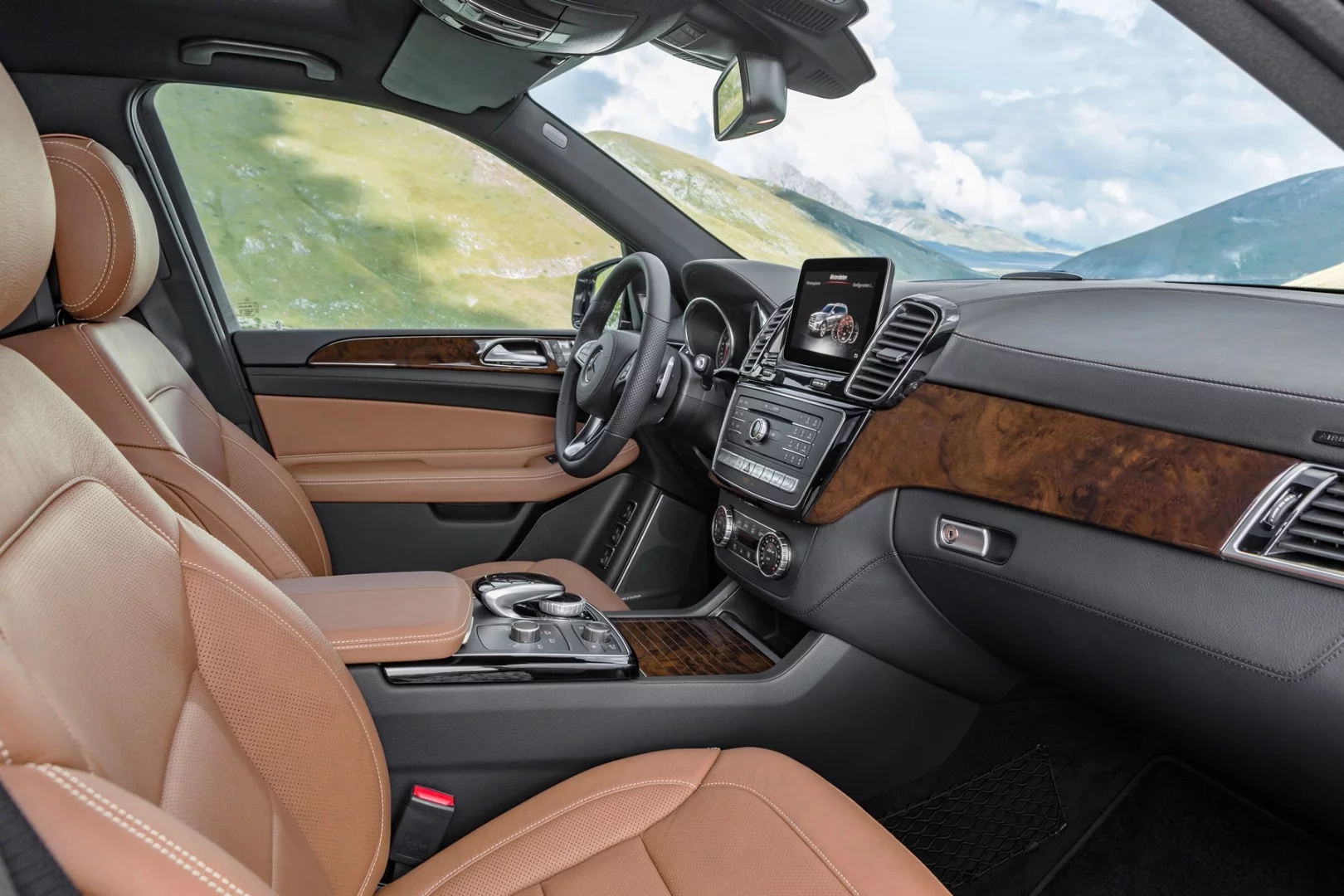 The GLS has a modified center console with a touchpad and a newly-designed instrument panel with an 8-in color display