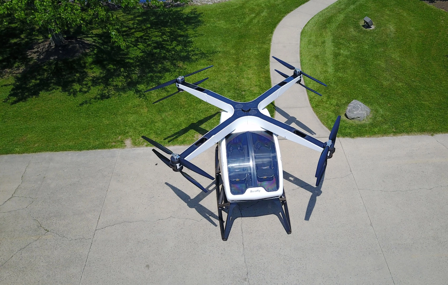 Workhorse first unveiled its Surefly flying car at the Paris Air Show in June last year, and has now put a person inside and lifted it into the air for the first time.