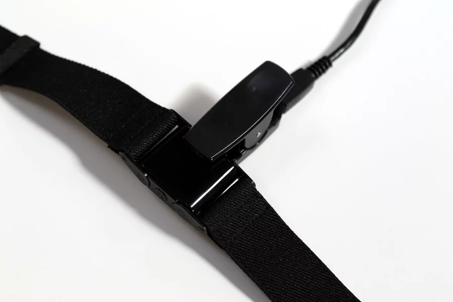 A USB connected crocodile clip is use to charge the PulseOn