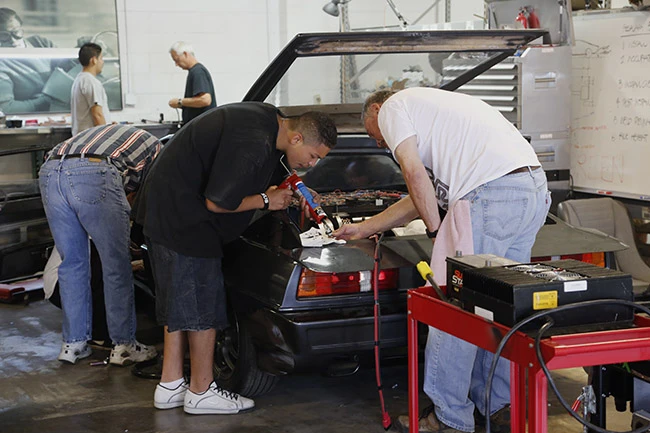 The team puts the finishing touches to the now-electric Lotus Esprit