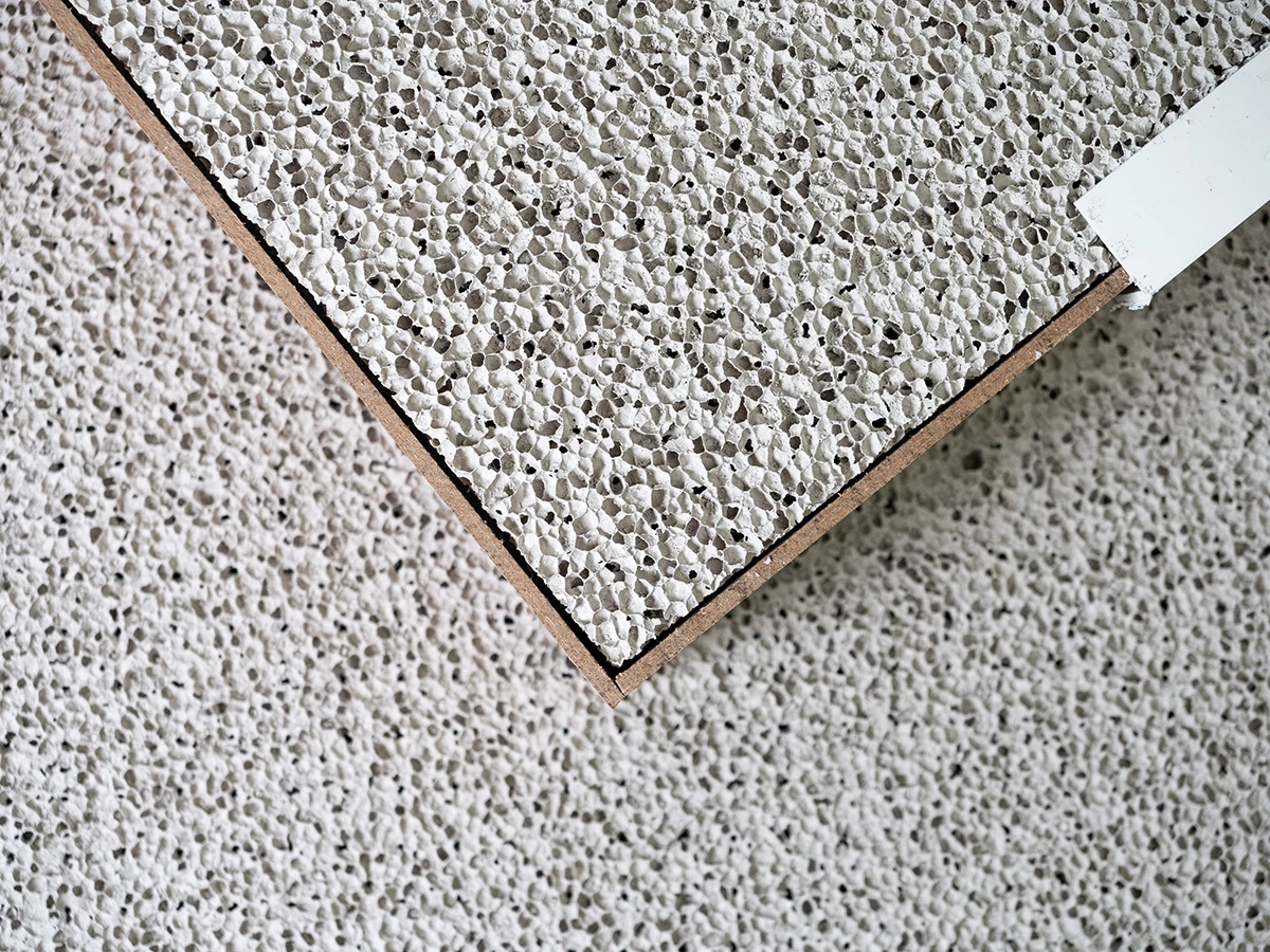 The new material is fireproof and weatherproof, but the perforation is presently done by hand, which means it takes a lot of time and effort to make