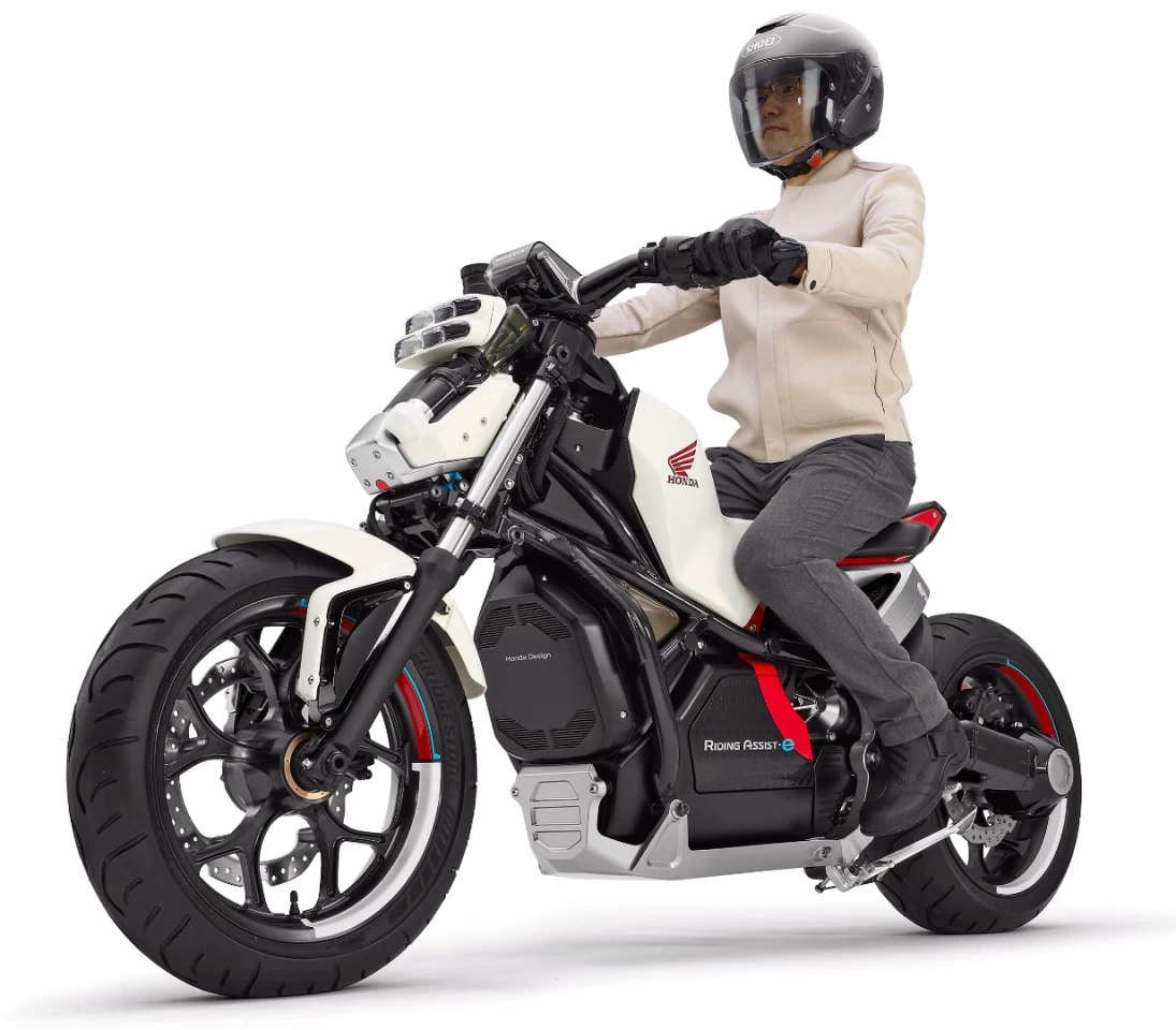 The Honda Riding Assist-e is an electric vehicle with a low center-of-gravity, a very low seat height, and a self-balancing technology which can be configured to intervene at very low speeds.