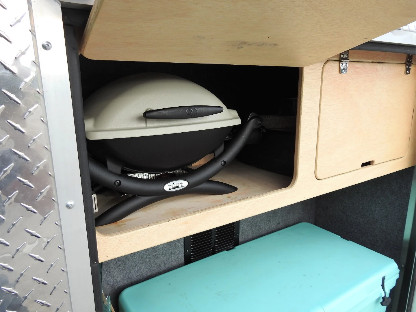 Cargo Camp doesn't build a kitchen into its trailers, but the rear storage area is there to carry a camp stove or grill, fridge or cooler, and other camp cooking equipment