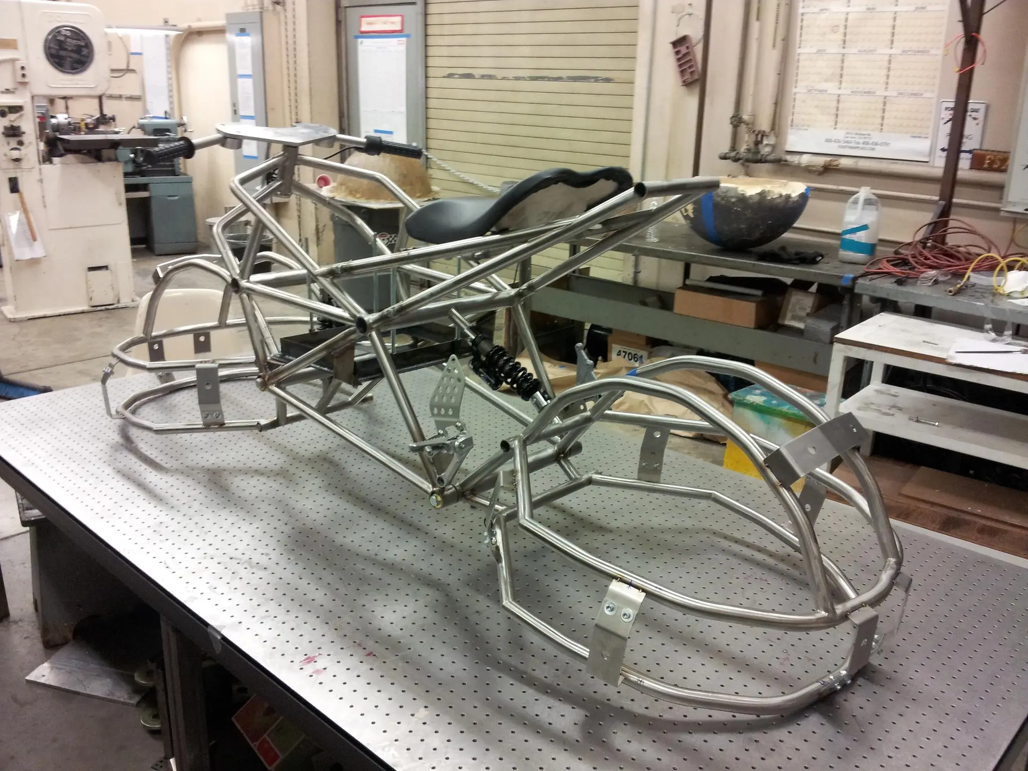 The rather shiny frame is fashioned from 304 stainless tubing, and there's suspension front and rear in the shape of Fox racing shocks