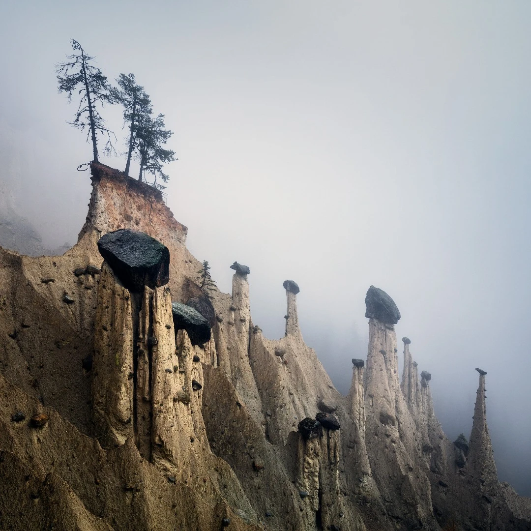 These bizarre natural formations found in South Tyrol, Italy are often focused on by photographers looking for surreal natural wonders. Martin Rak's collection captured these iconic spaces shrouded in fog, adding to the weird uncanny landscape (Credit: Martin Rak Behance (CC BY-NC-ND 4.0))