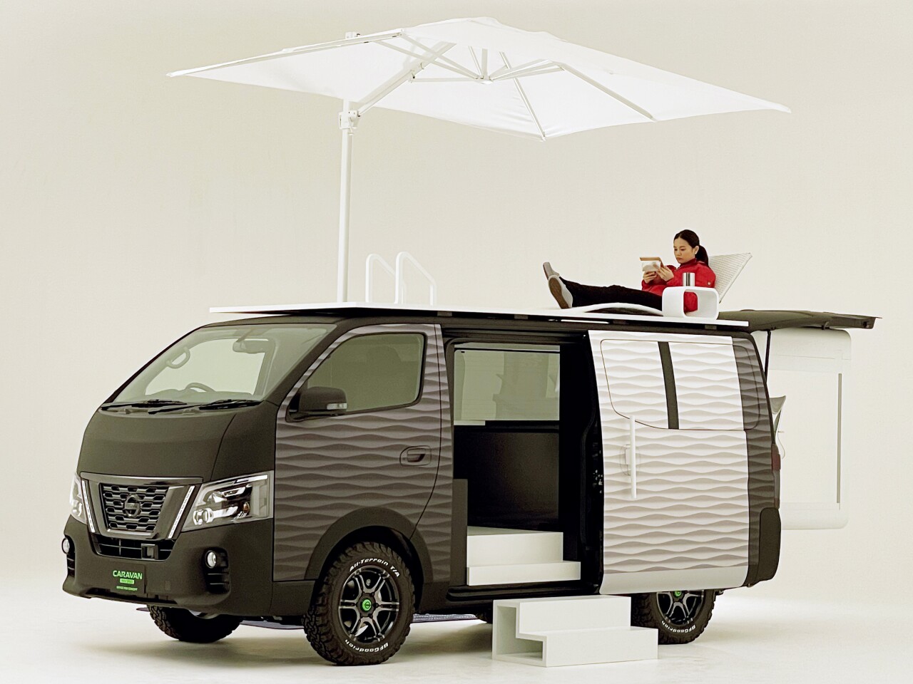 Whether working hard or hardly working, the Nissan NV350 provides a comfortable private office space in the wild