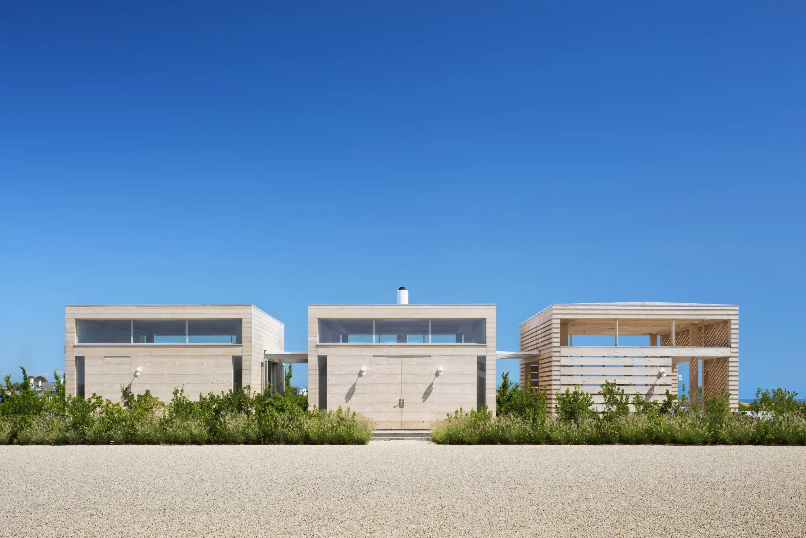 Ocean Pond Residence, New York, USA by SheltonMindel. A winner under the "Private Homes" category at the 2018 International Architecture Awards, this building is situated on a 42-acre oceanfront block and keeps a low profile to blend in with the landscape