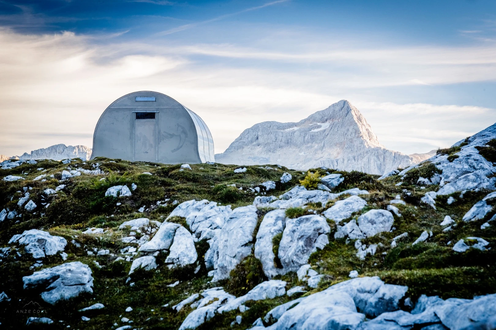 Bivak II na Jezerih is made from welded steel and anchored in place with concrete