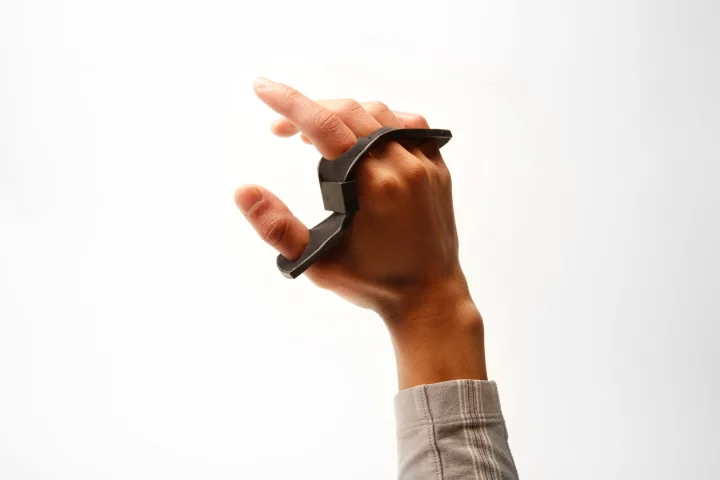 The Tap Strap is worn on the hand