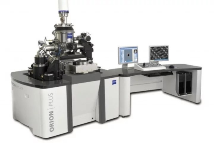 By focusing helium ions into a beam, instead of electrons, the microscope can offer higher focus with lower sample damage.