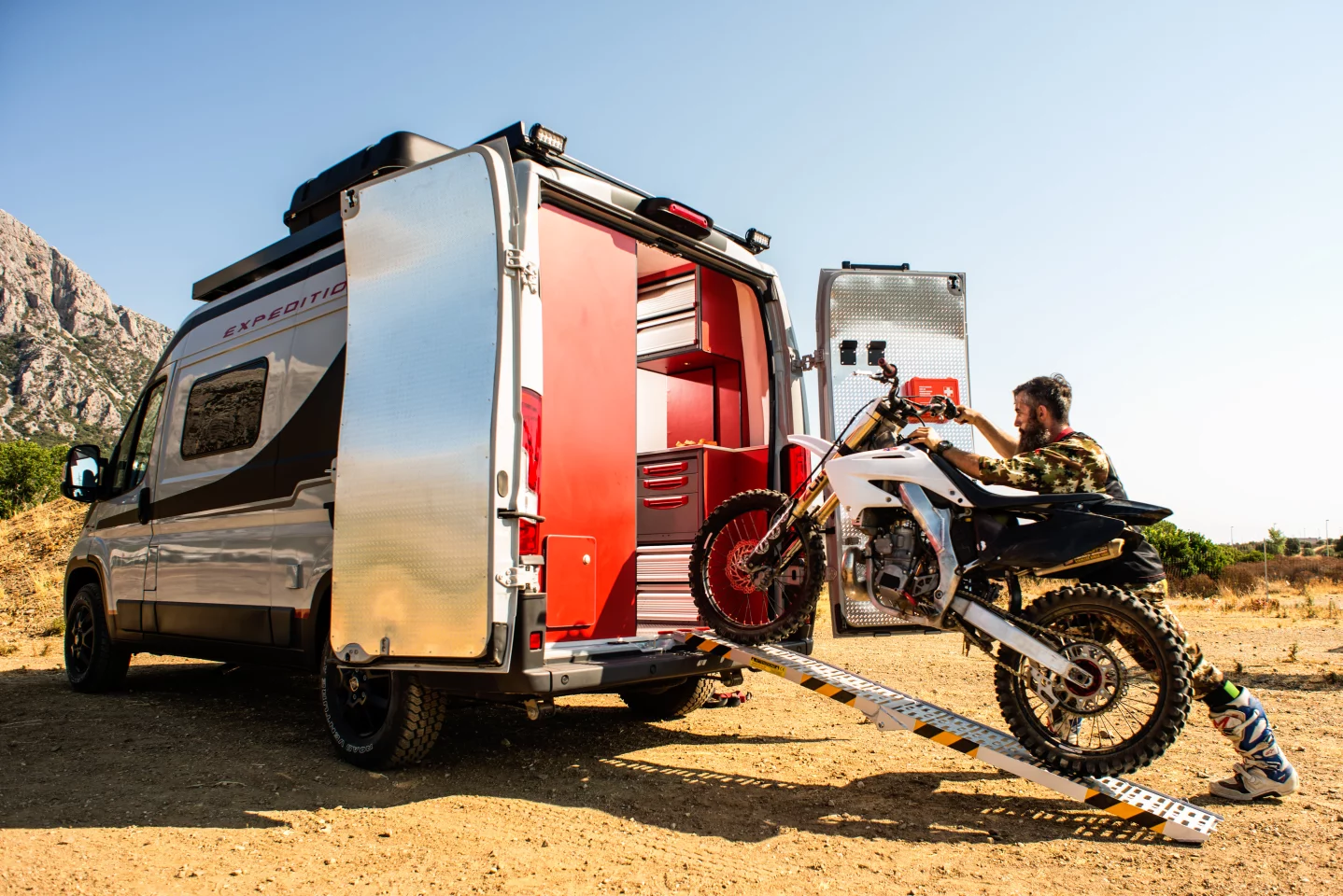The interior looks dedicated entirely to bike-hauling and wrenching, but it's hard to tell for sure from this partial view