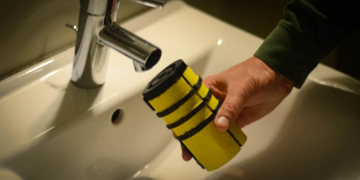 The battery pack can be used on its own, installed over the end of a faucet or hose