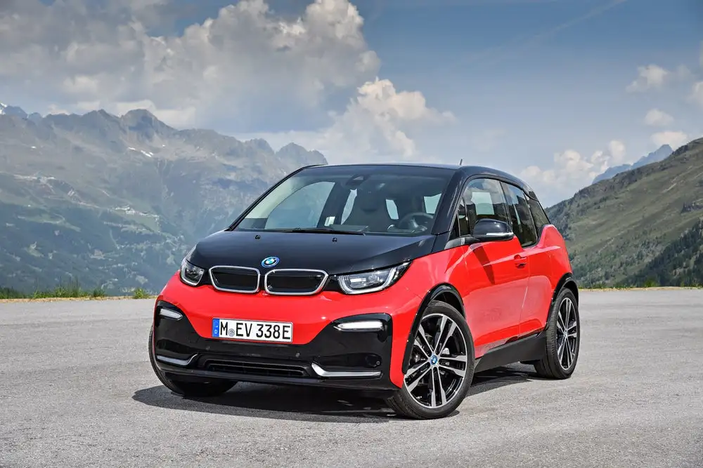 For 2018, BMW has released a sporty version of its baby plug-in EV called the i3s. Sacrificing a little bit of range for higher power and torque the new i3s gets a "go-faster" paint job to match