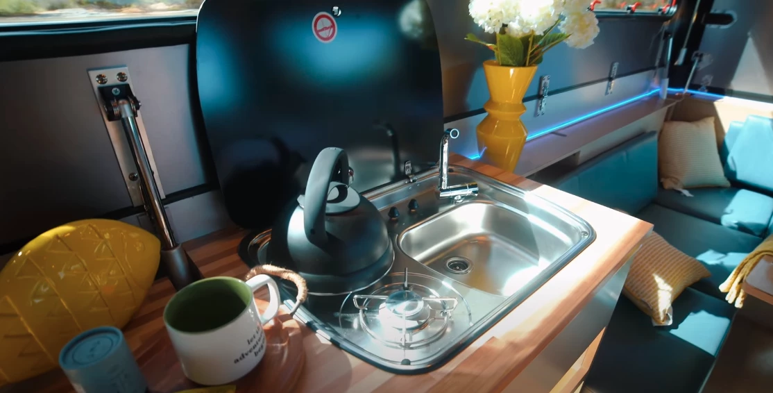 The compact indoor kitchen block is fully augmented by the slide-out outside kitchen