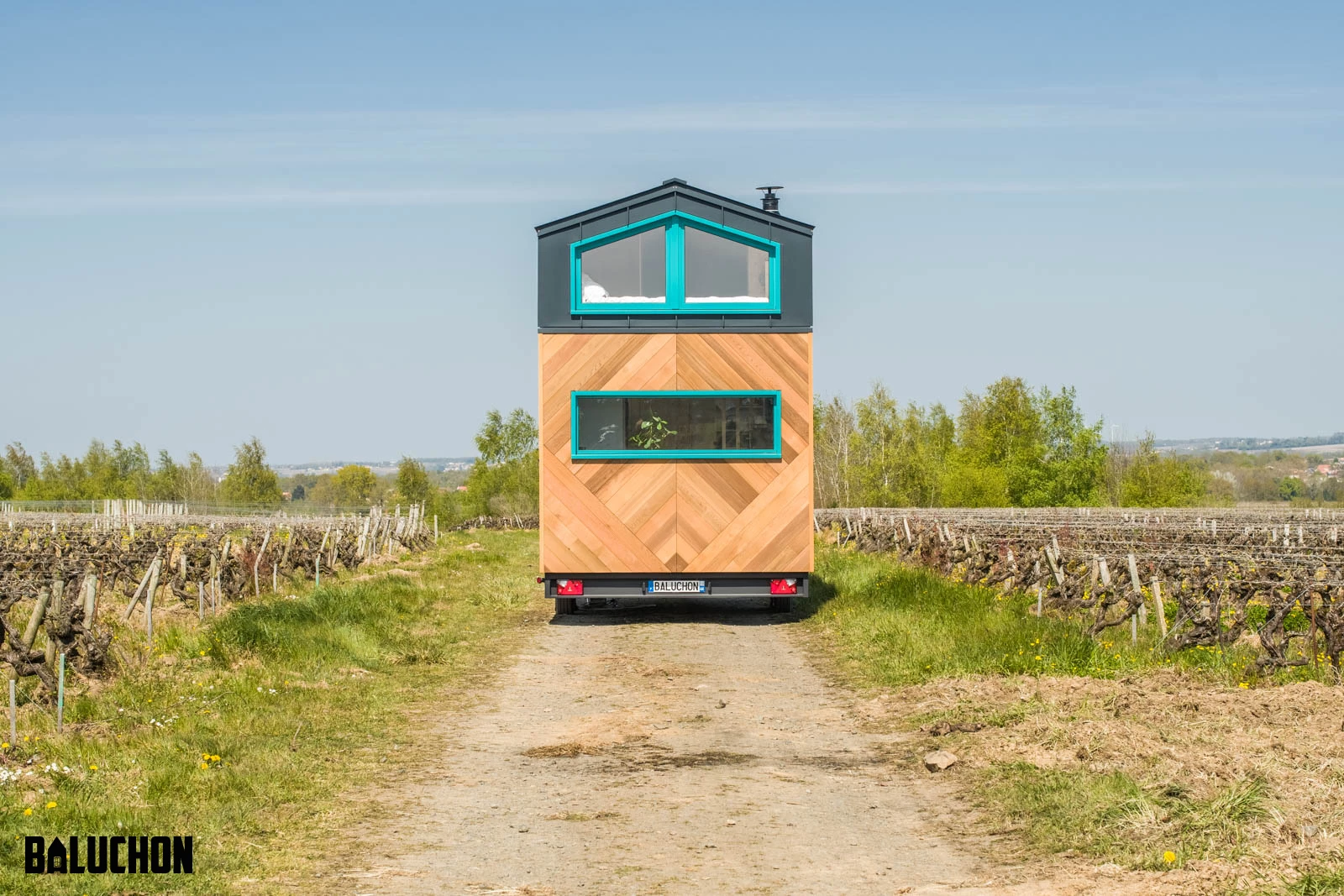 Tiny House Sïana is finished in cedar, with aluminum accenting