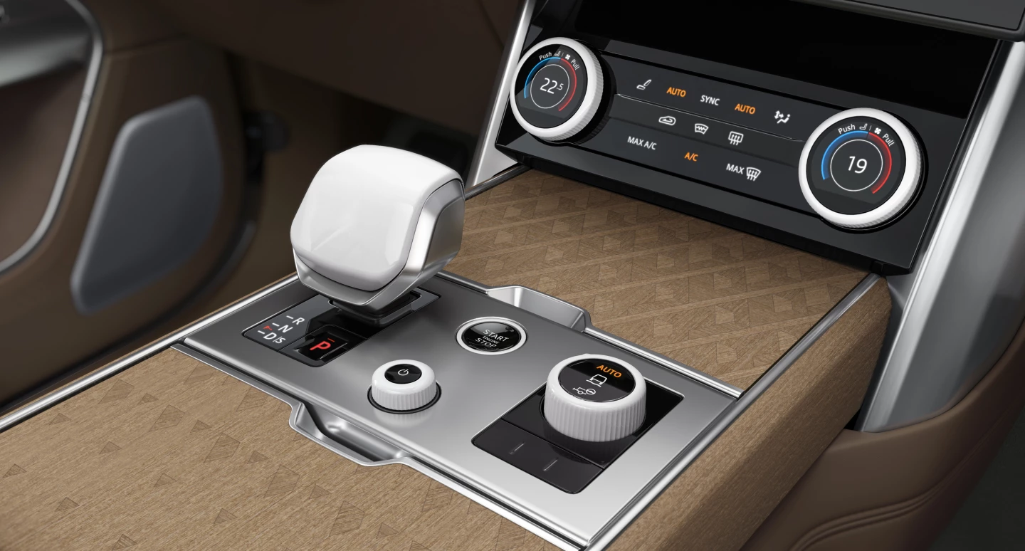 Beautiful wood, metal, and other materials are found throughout the new Range Rover's interior