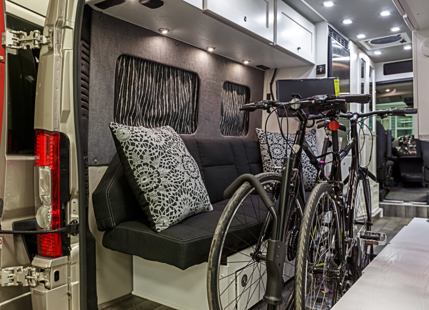 The Roadtrek's open center aisle makes loading bikes, kayaks and other gear easy