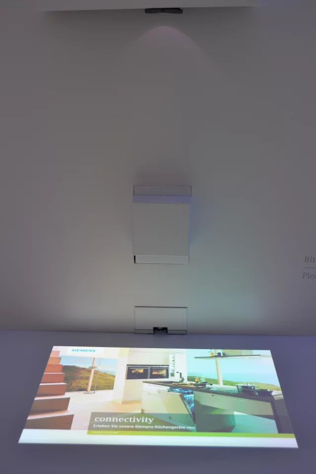 A multi-touch display of recipes would be projected onto the cooking surface
