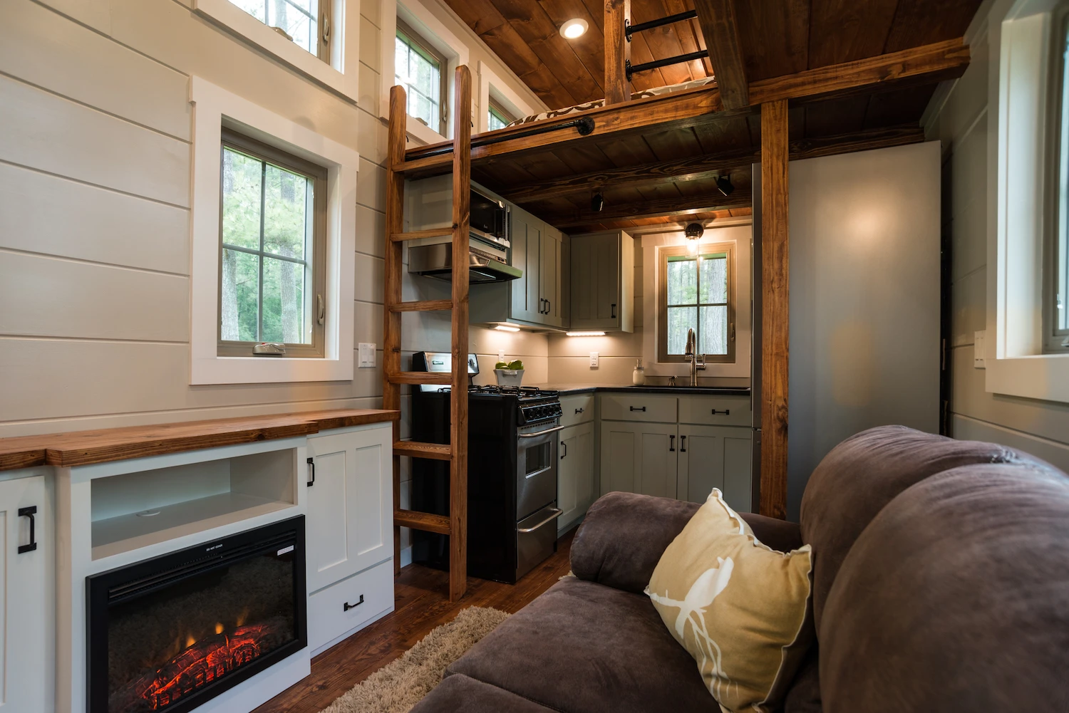 The Retreat's living room includes an electric fireplace