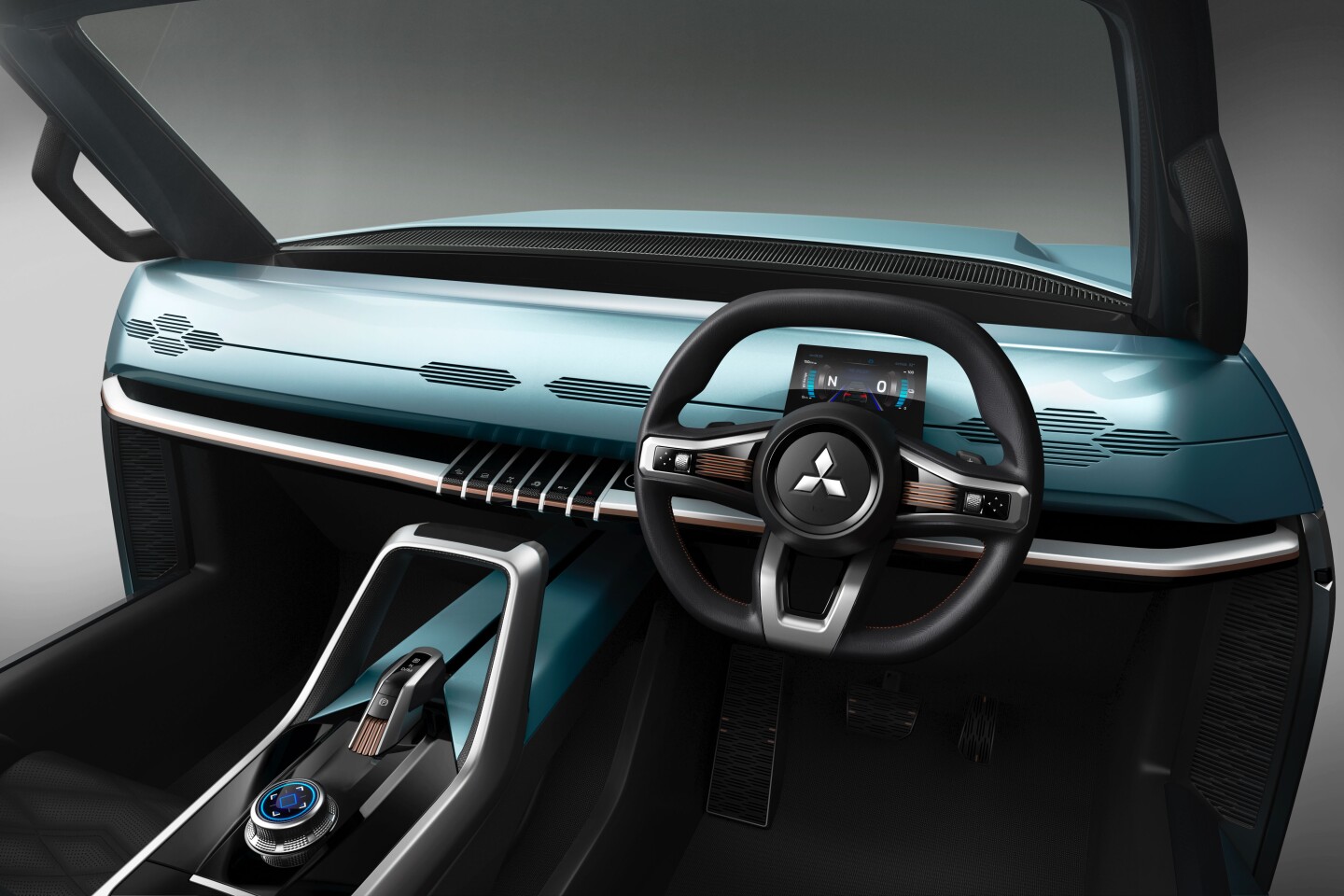 The interior is as simple as you might expect from a doorless dune buggy, with a few physical controls, small display and steering wheel — the AR windshield adds some extra functionality not pictured here