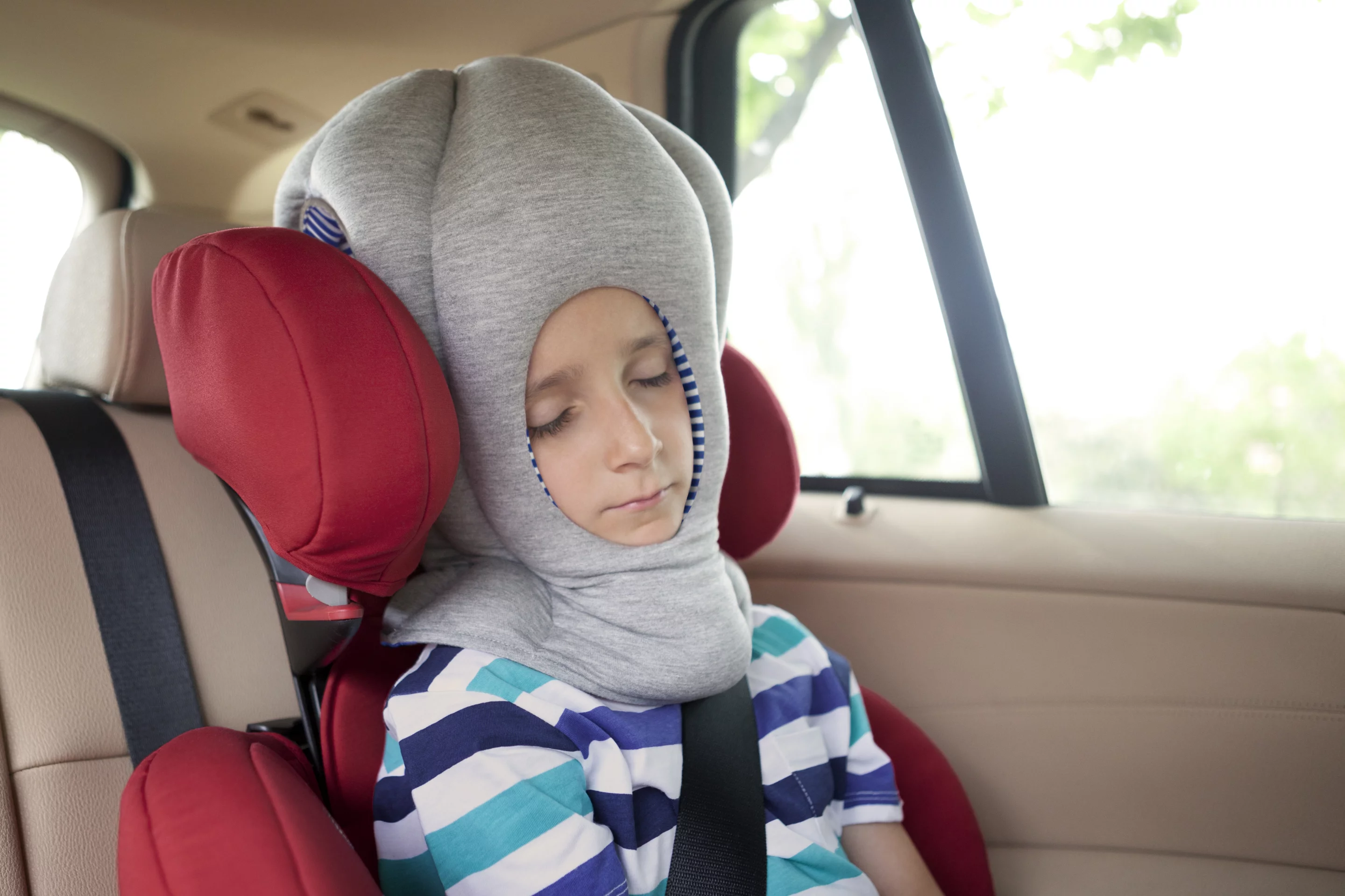 The Ostrich Pillow Junior features a more open face hole for better breathing