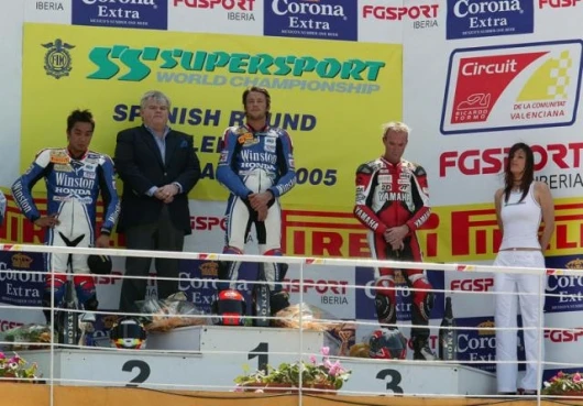 Katsuaki Fujiwara (Winston Ten Kate Honda CBR600RR) second, Ronald ten Kate (Team Manager and engine tuner extraordinairre) Sebastien Charpentier (Winston Ten Kate Honda CBR600RR) first and a whistful Kevin Curtain (Yamaha Motor Germany R6), third.