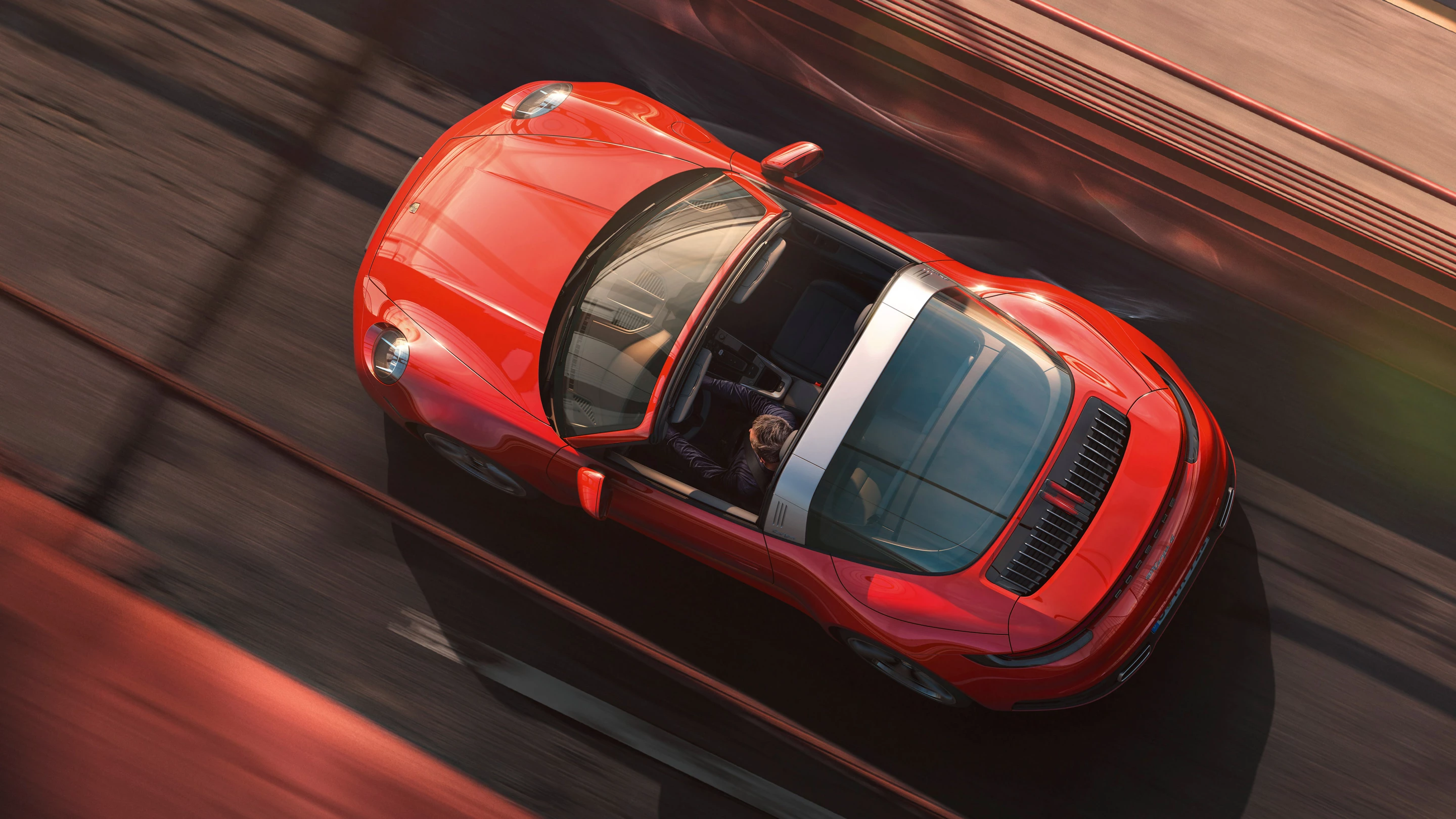 Open-top driving, Targa-style, with a big rear windshield