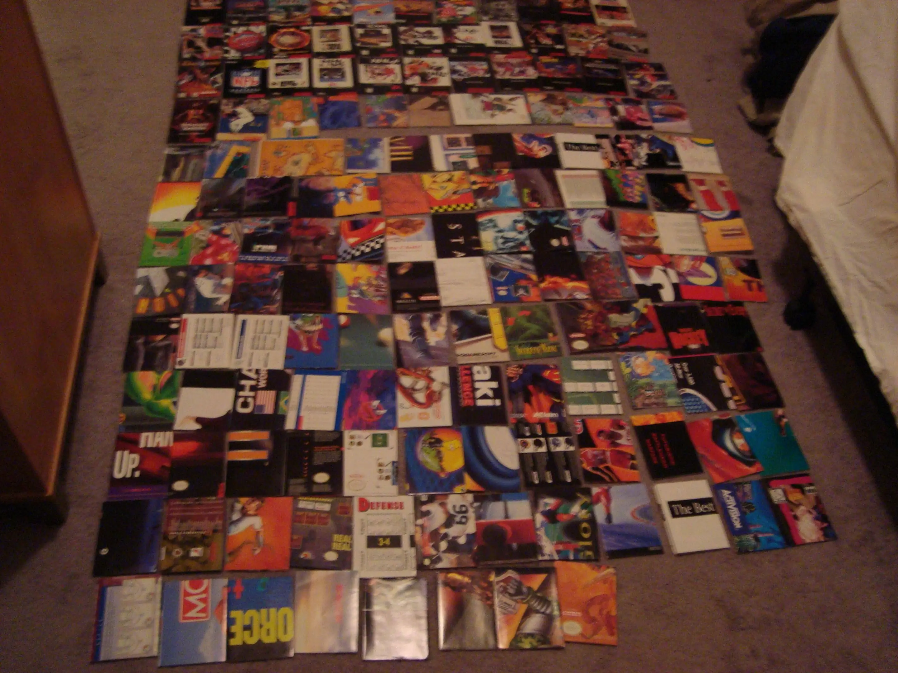 A huge pile of SNES boxes spread across the floor