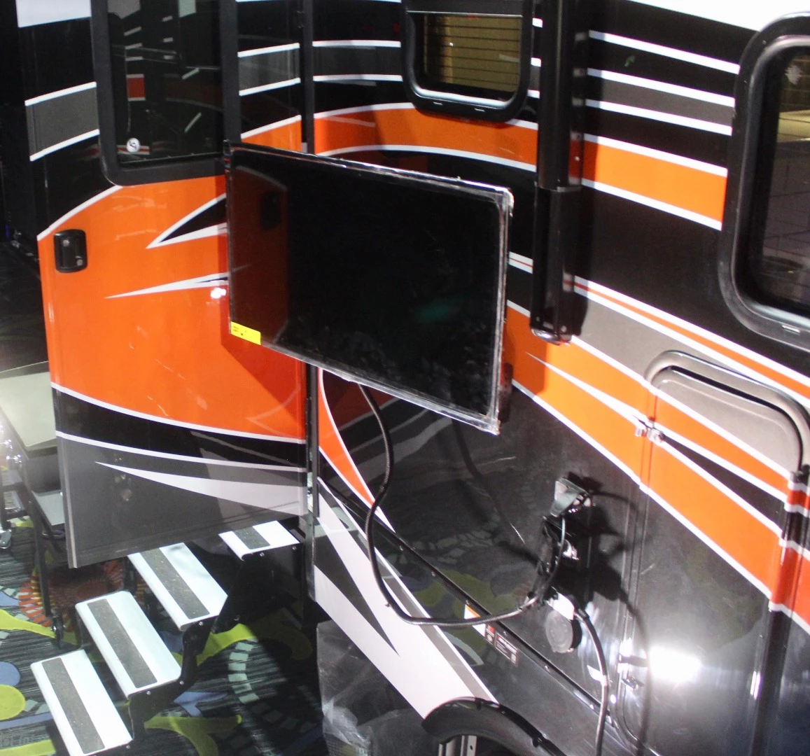 One outdoor TV just isn't enough on an over-the-top trailer like this, so Heartland adds a second
