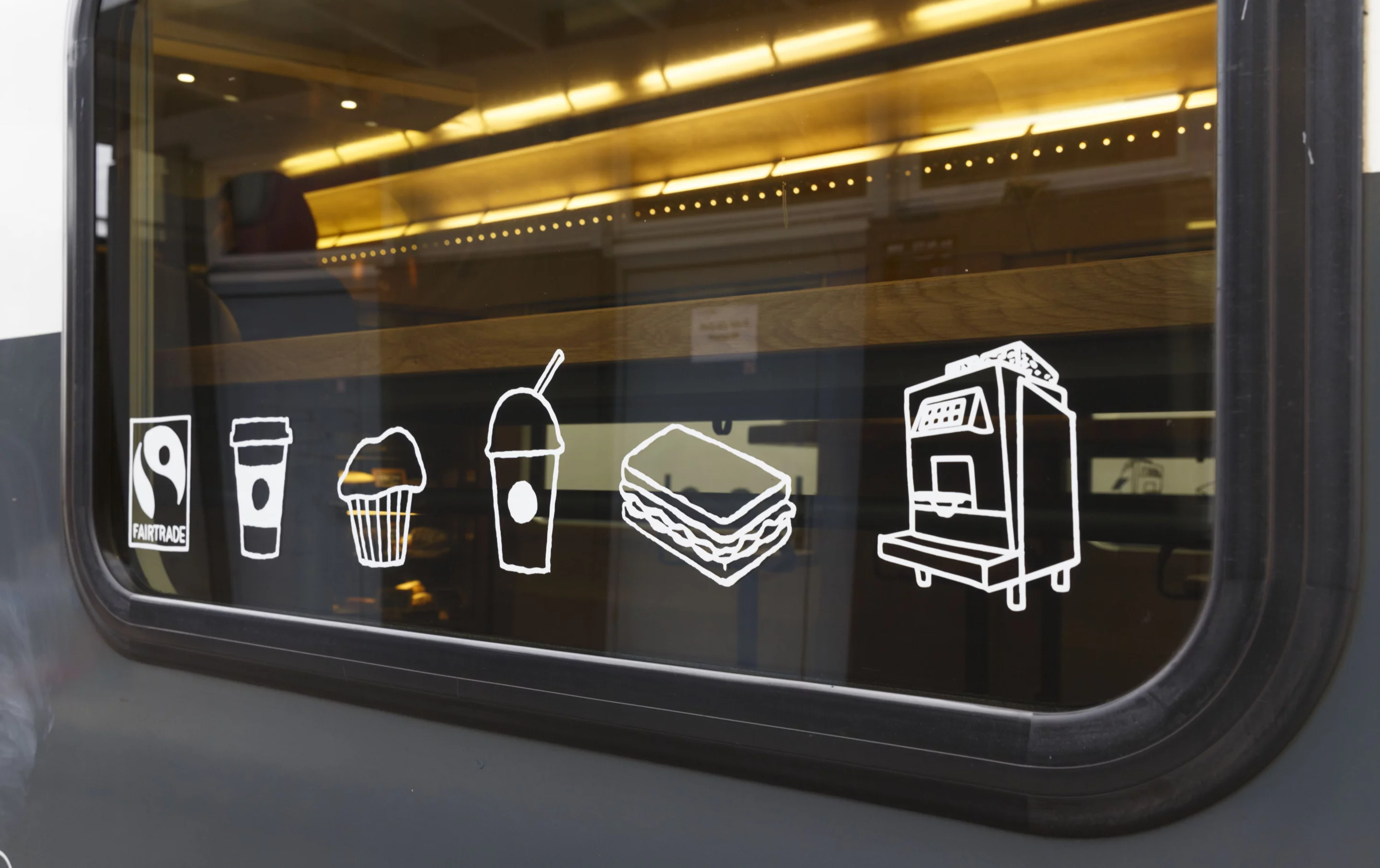 The windows have symbols showing menu items on offer