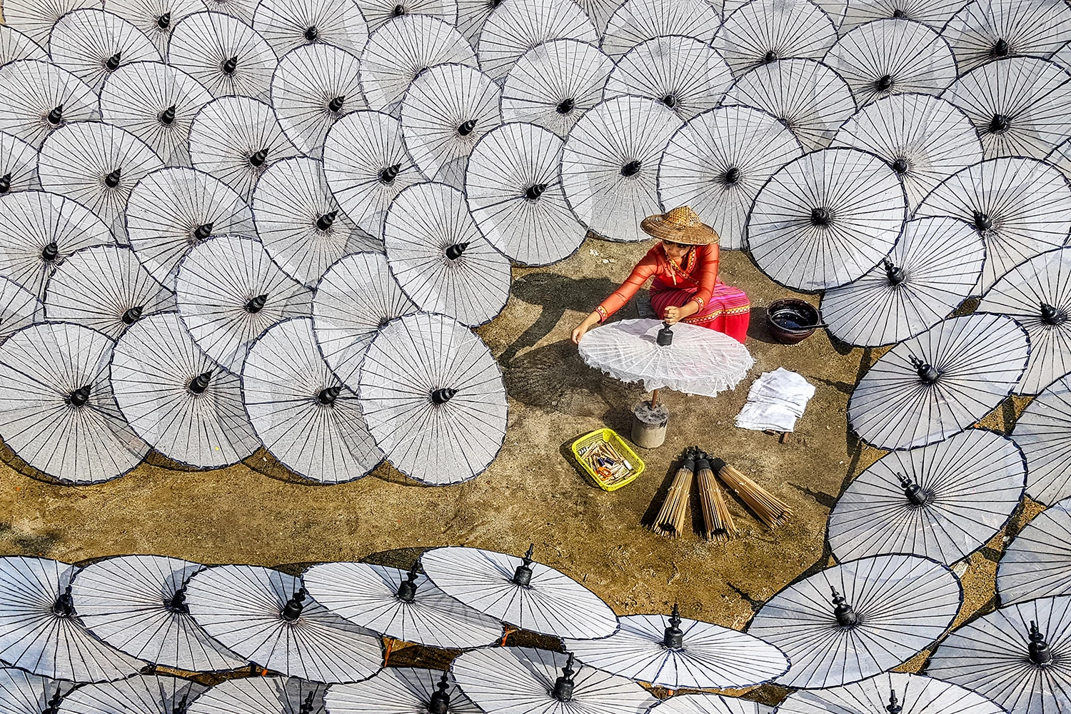 iTRAVELLED – PHONE/TABLET SINGLE IMAGE CATEGORYHIGHLY COMMENDED: Chin Leong Teo (Singapore)Myanmar, MandalayIn Myanmar, some small and medium enterprise factories still produce traditional umbrellas, used mostly for ceremonies and festivals, by hand. The first stage of production involves wrapping a large, white, water-proof cloth on a bamboo structure. Thereafter the umbrellas can be hand-painted in any colour and design.Samsung SM-G950F, f1.7, 1/2500 sec, ISO 40