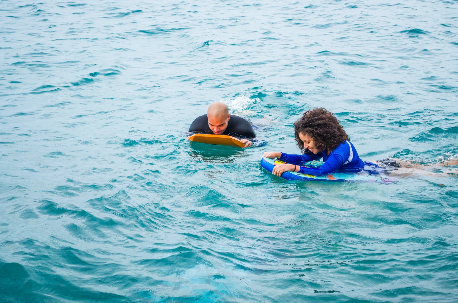 The Snorkelboard is a vinyl-coated foam flutter board, with a transparent diving mask-like window built into it