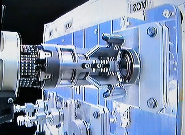 The Multifunction Tool uses its attached adapter to manipulate a plug located under the Ambient Cap on the RRM module (Image: NASA/CSA)
