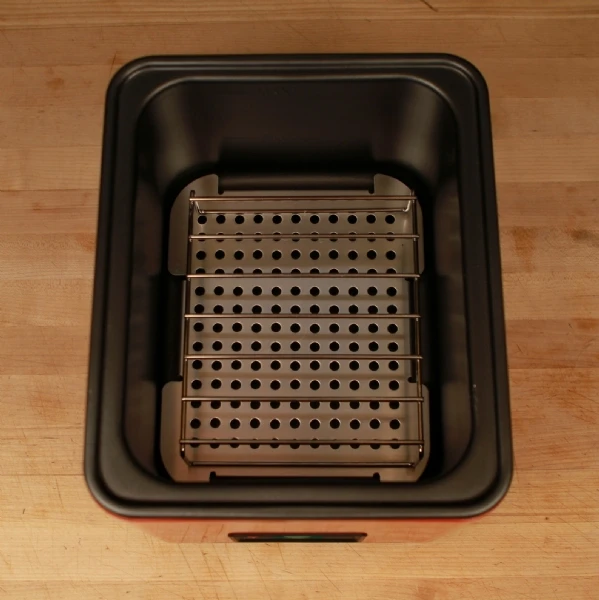 The SousVide Supreme Demi uses an electronically controlled precision heating element and continuously circulates water around the food for even cooking