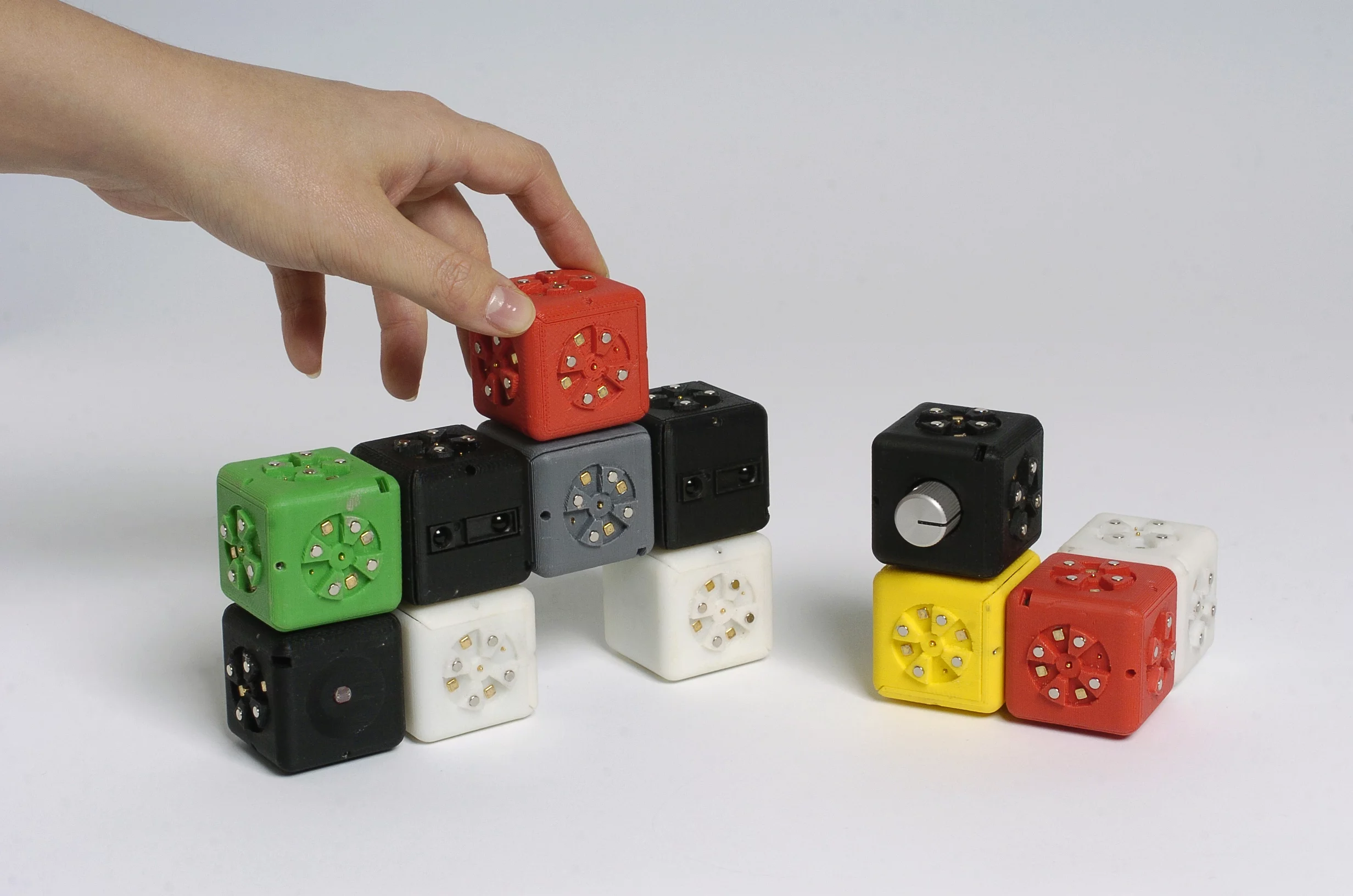 The Cubelets robotic construction kit allows anyone to build simple robots using blocks that magnetically snap together, the overall behavior determined by the interaction between them