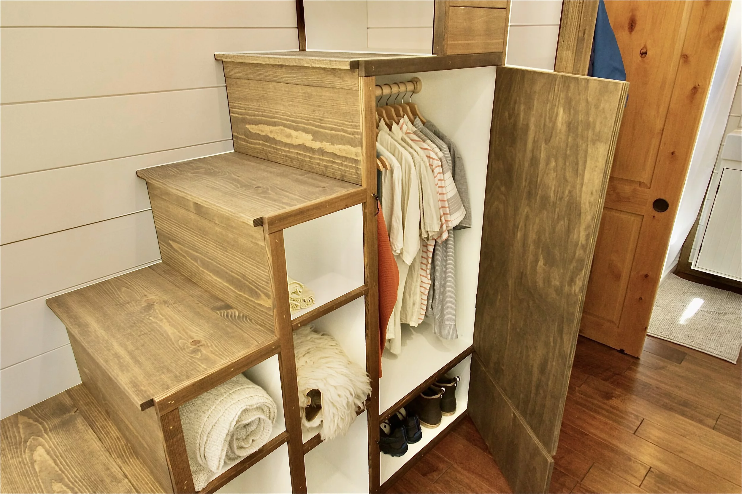 The Sonoma's bedroom is accessed by storage-integrated steps