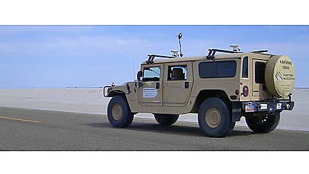 The Kairos Autonomi Pronto4 Agnostic Autonomy system is a strap-on kit that adds self-driving or remote-control capability to any steering wheel based vehicle - in this case a HMMWV