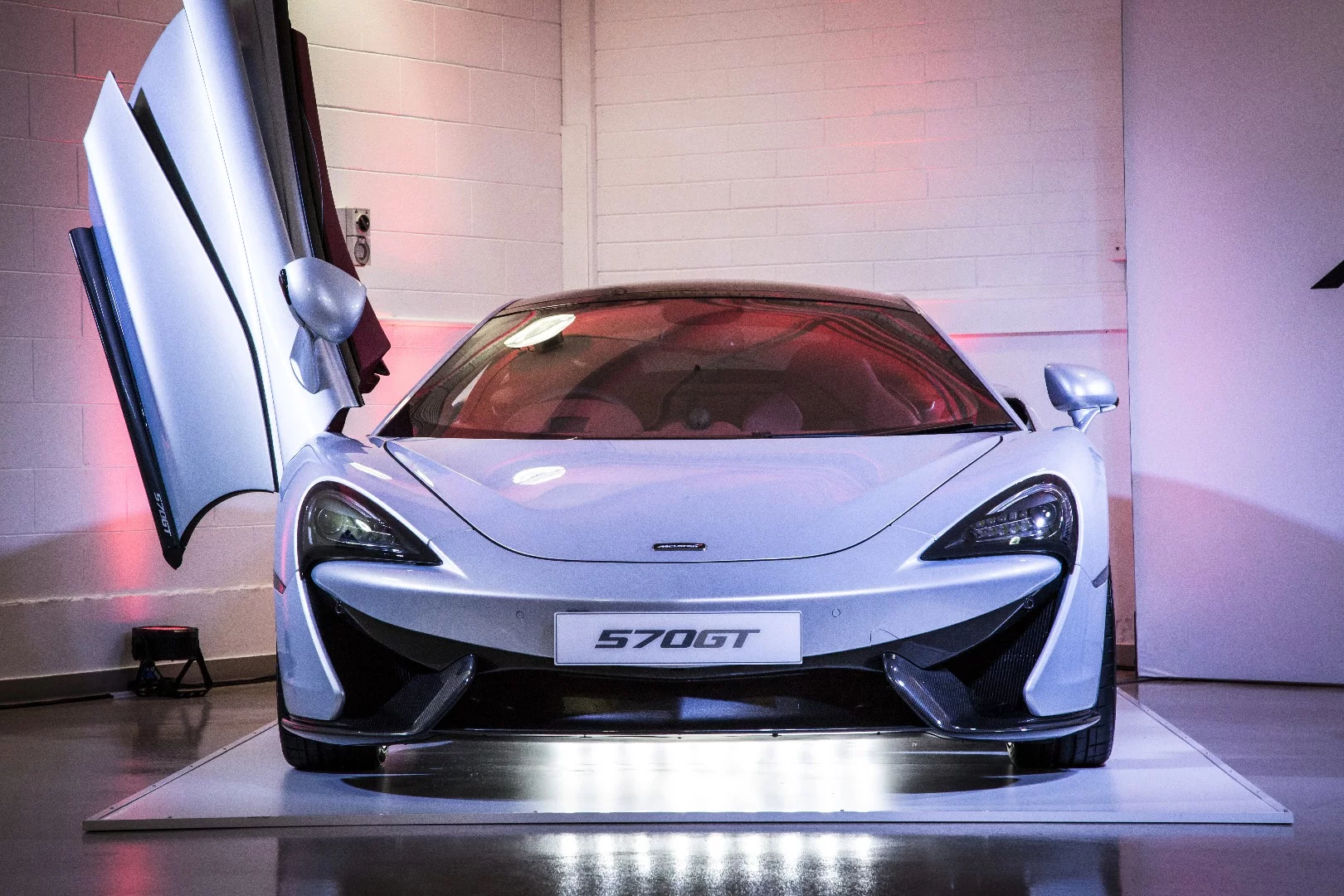 McLaren has designed the car's doors to open up instead of out in order to make entry and egress easier in tight garages