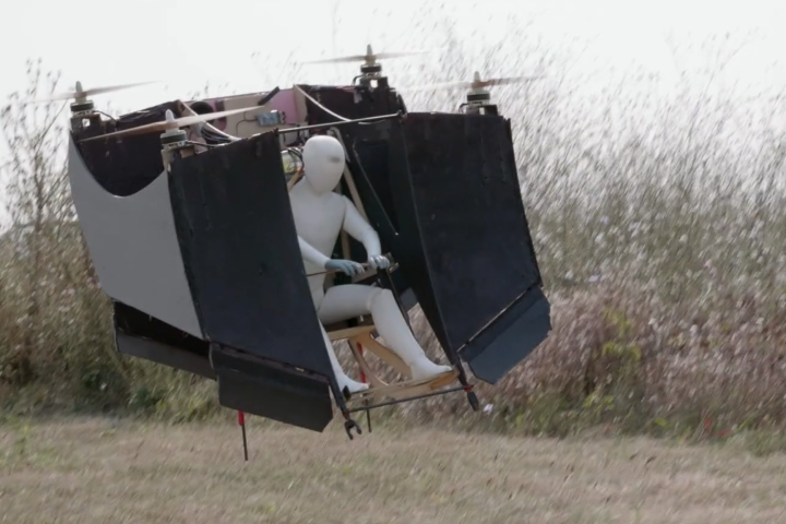 Mad Bat prototype in vertical flight, complete with a dummy pilot