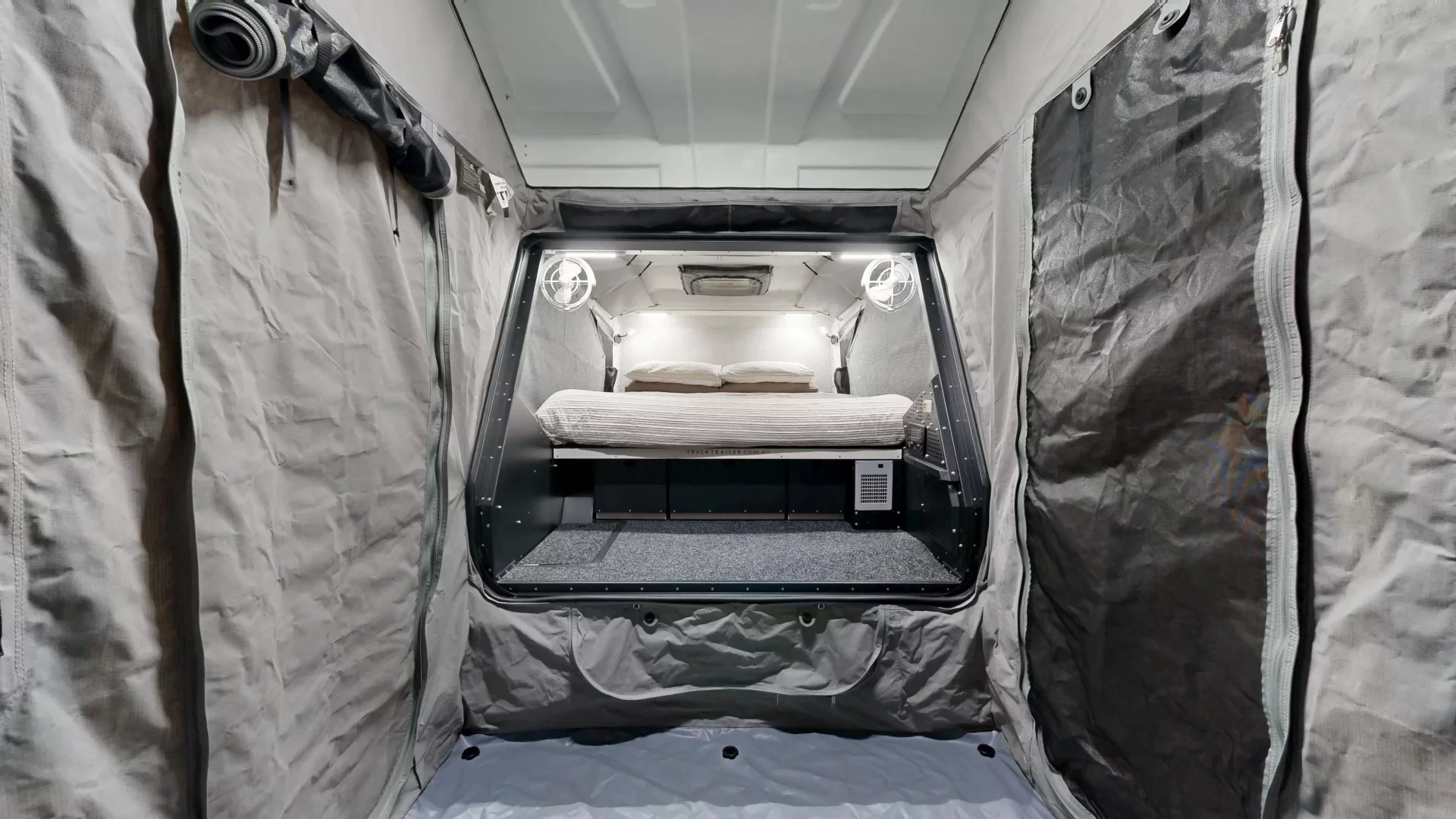 Stepping back on the rear deck inside the tent