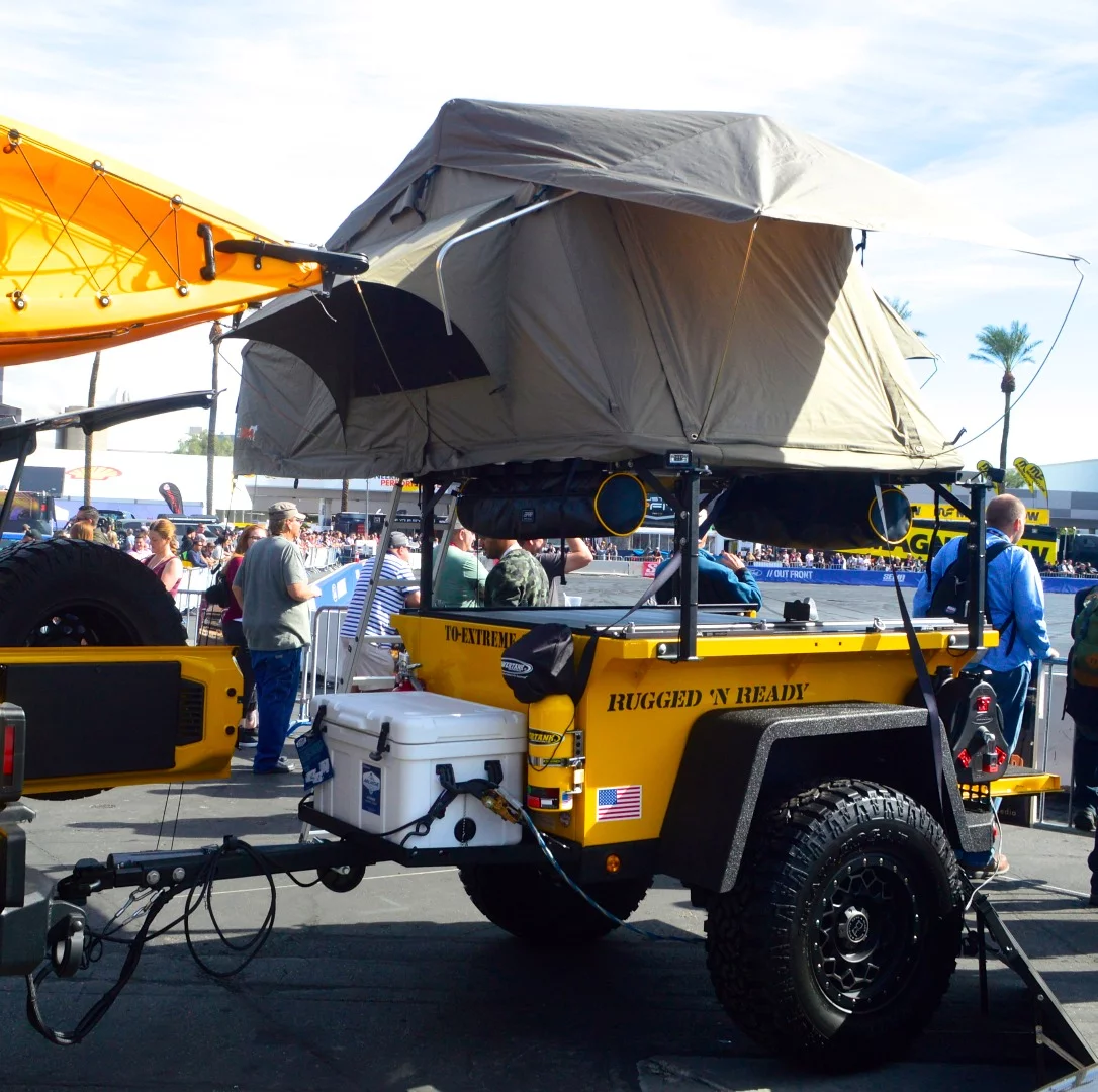 The Jeep Wrangler up front tows sleeping accommodations atop the Rugged 'n Ready trailer