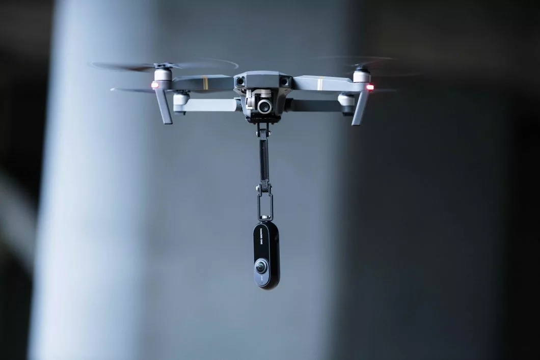 The Insta360 One camera dangling from a drone