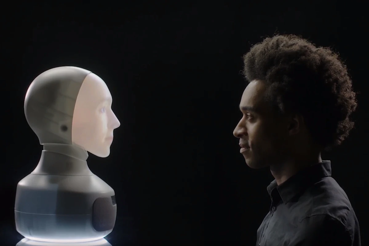 The Furhat system uses back-projection to display a human face onto a mask