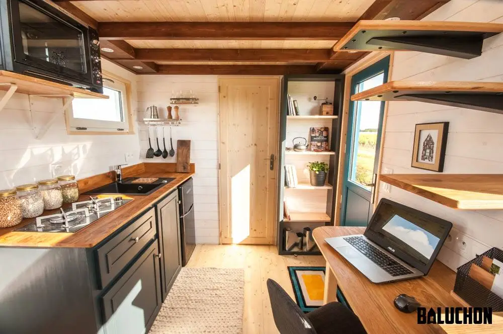 View towards the Valhalla's kitchen. The bathroom is behind the door pictured