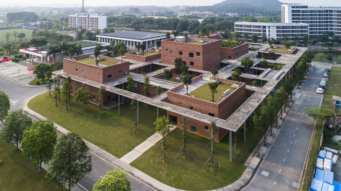 The Viettel Offsite Studio is situated next to the Viettel Academy Educational Centre, shown, also designed by VTN Architects