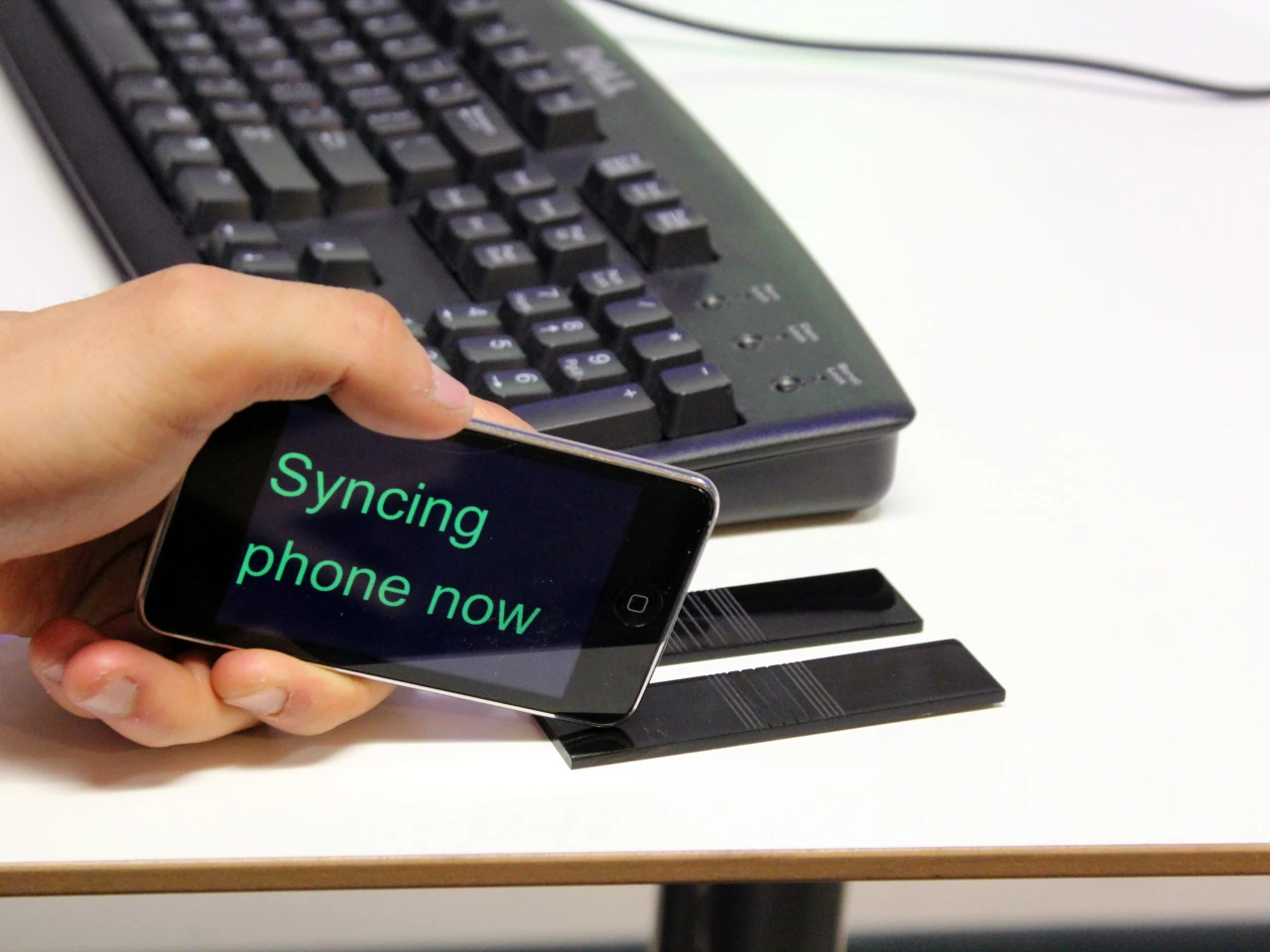The system is capable of using the internal microphone of mobile devices to register the acoustic barcodes