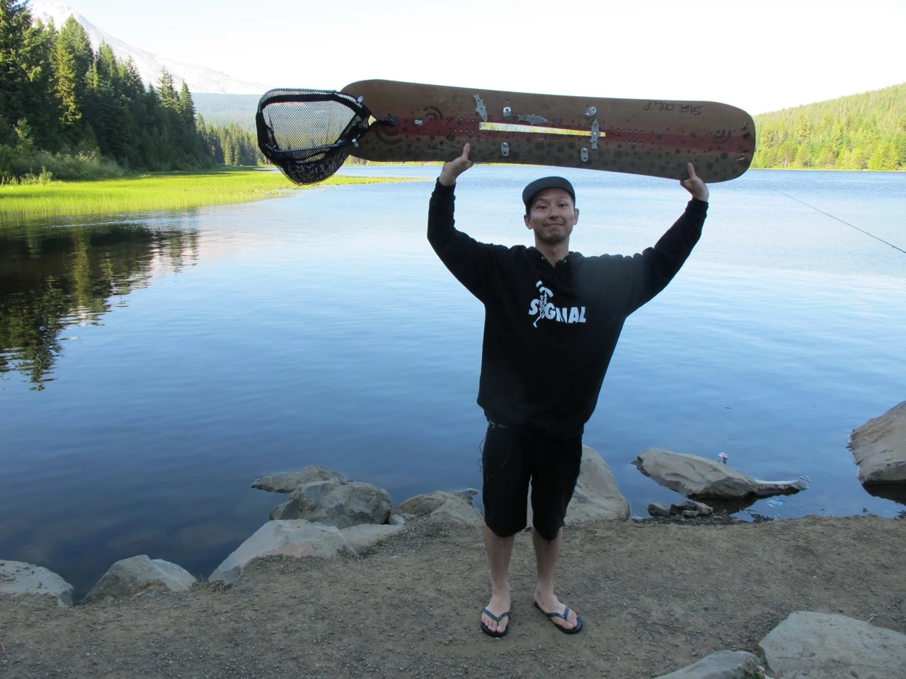 Signal pro rider Yusaku Horii poses with the board
