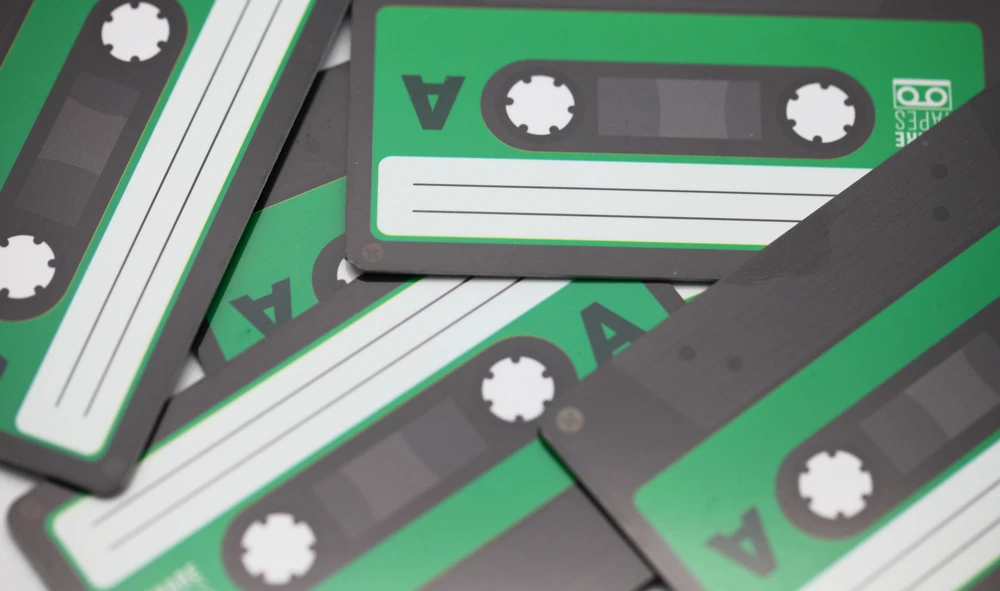 A stack of five Sharetapes cards for use with NFC and QR enabled smartphones