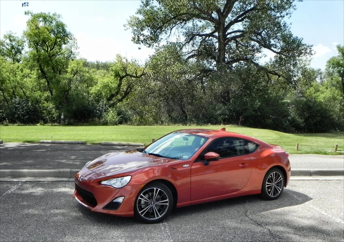 Strong fenders and a tapered body showcase the rear-wheel drive visually